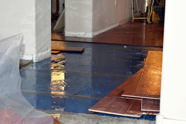 Professional Flood Damage Restoration technician working in Sister Bay, WI